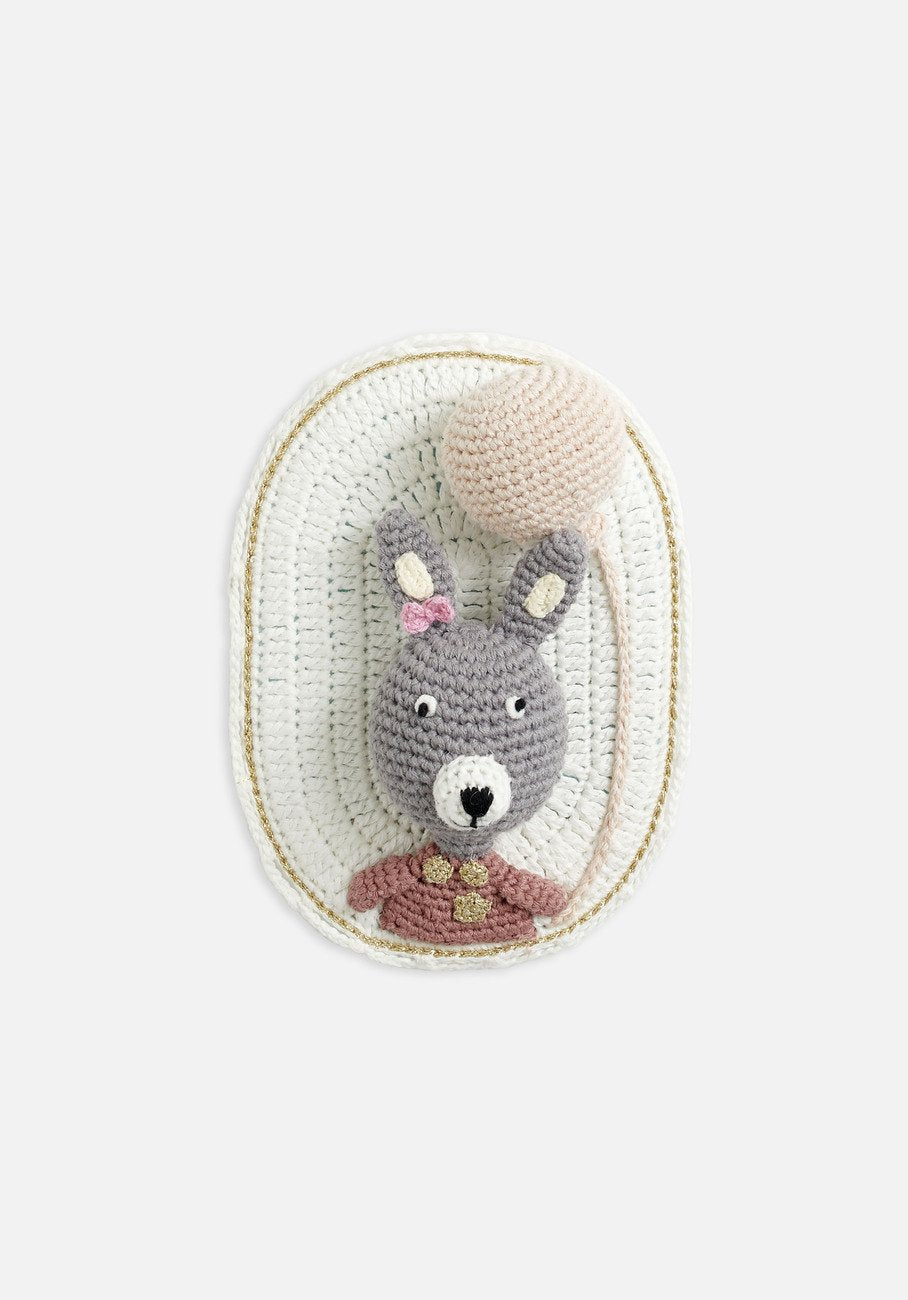 wall hanging bunny on white backing and balloon 